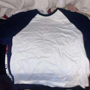 white shirt with dark blue long sleeves